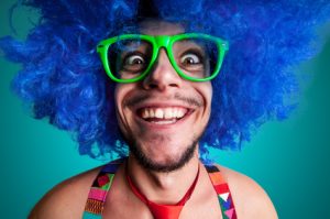 Crazy Guy with green glasses staring at you