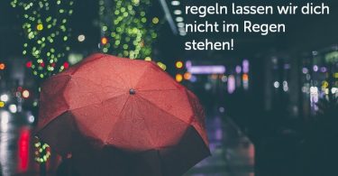 Roter Regenschirm als Symbol für den Schutz durch die Kniggeregeln - Meeting-Knigge